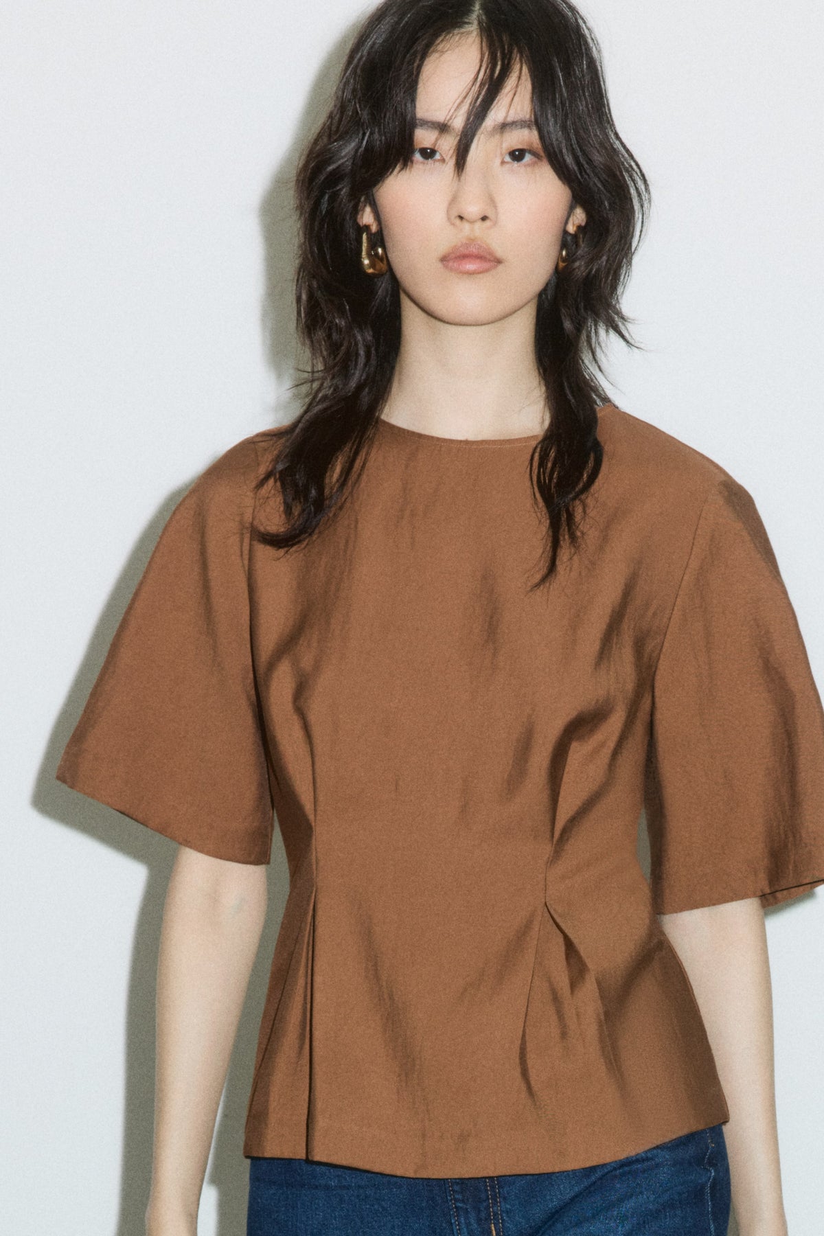 Blusa com cintura cingida