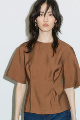 Blusa com cintura cingida